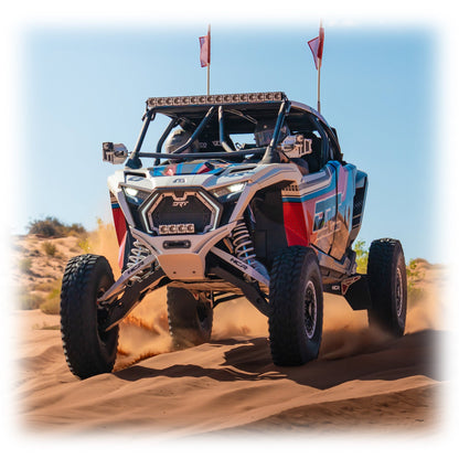 DRT Polaris RZR Pro R /Pro S/Turbo R 2022+ riding on sand with the V2.0 Front Winch Bumper on white