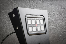 Auxbeam XL 8 Gang Mount by StayFlush Motorsports, sturdy black mounting bracket with multiple switch slots for auxiliary lights.