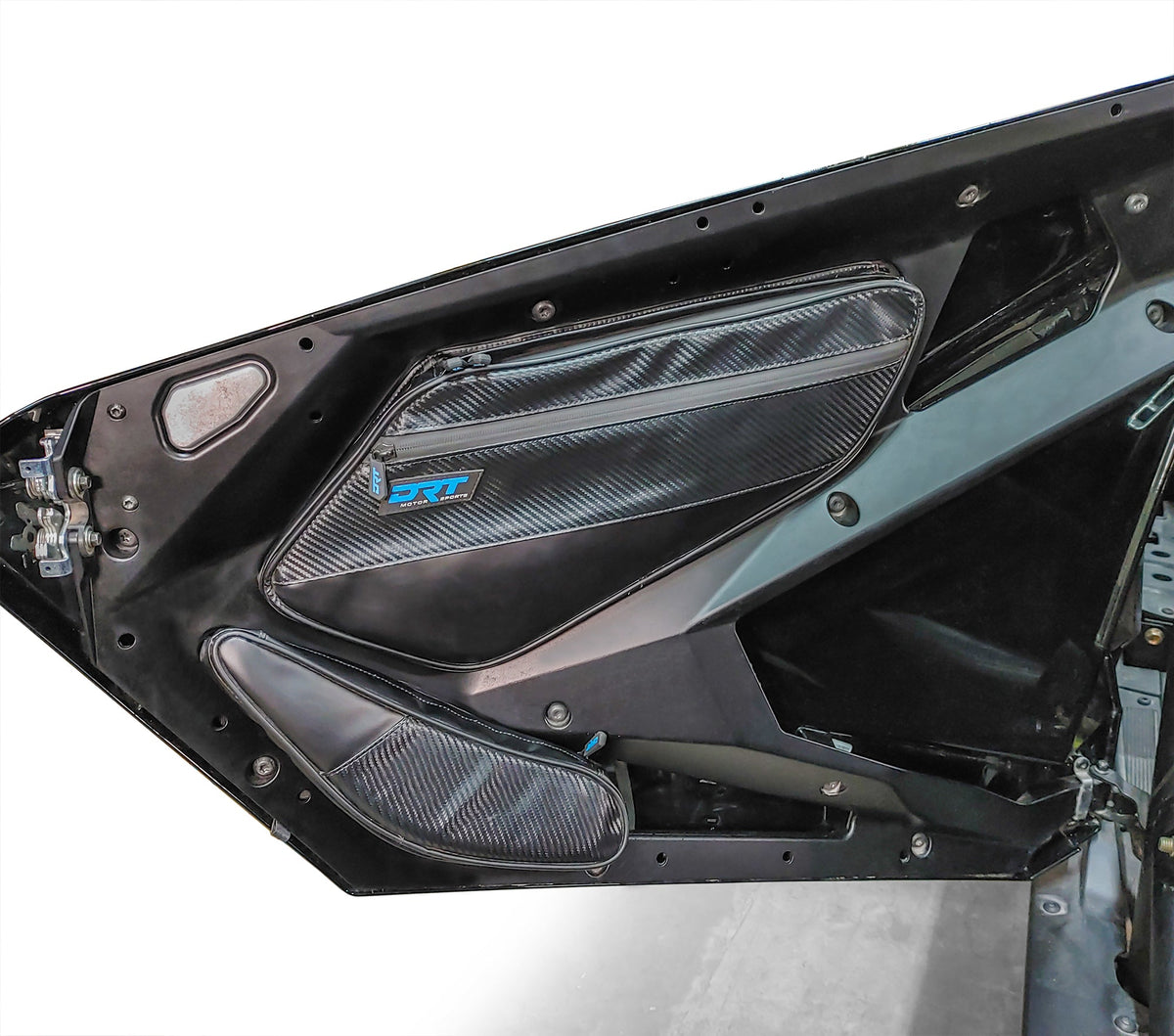 Close-up of front door storage pockets installed on RZR Pro XP