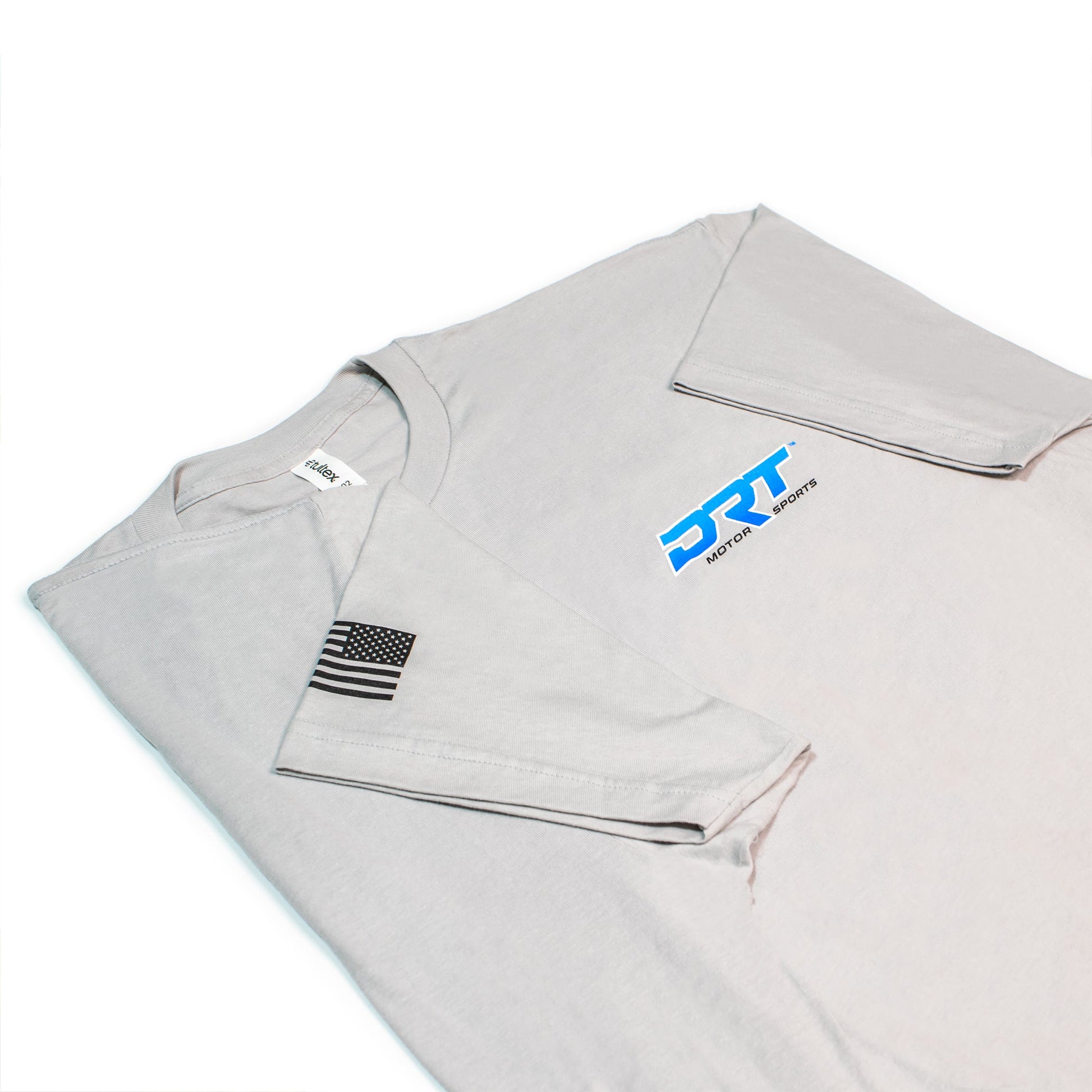 Front view of a motorsports tee laid flat in grey