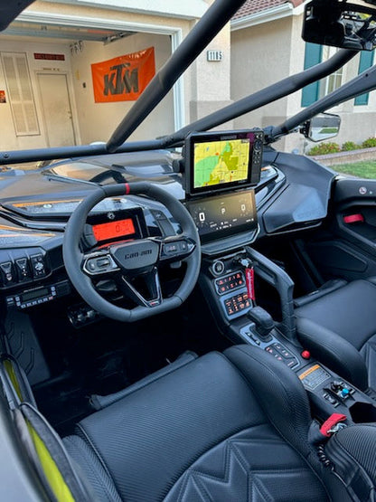 StayFlush Motorsports SFM MaverickR GPS mount attached to a vehicle dashboard, showcasing secure mounting for GPS devices.