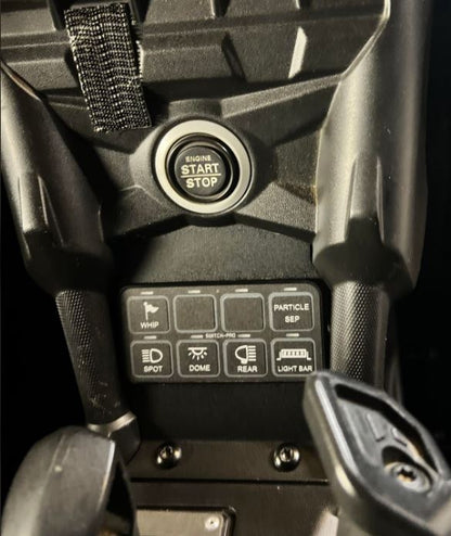 StayFlush Motorsports SFM SwitchPro8 CanamX3 console lower plate mounted on the vehicle's interior.
