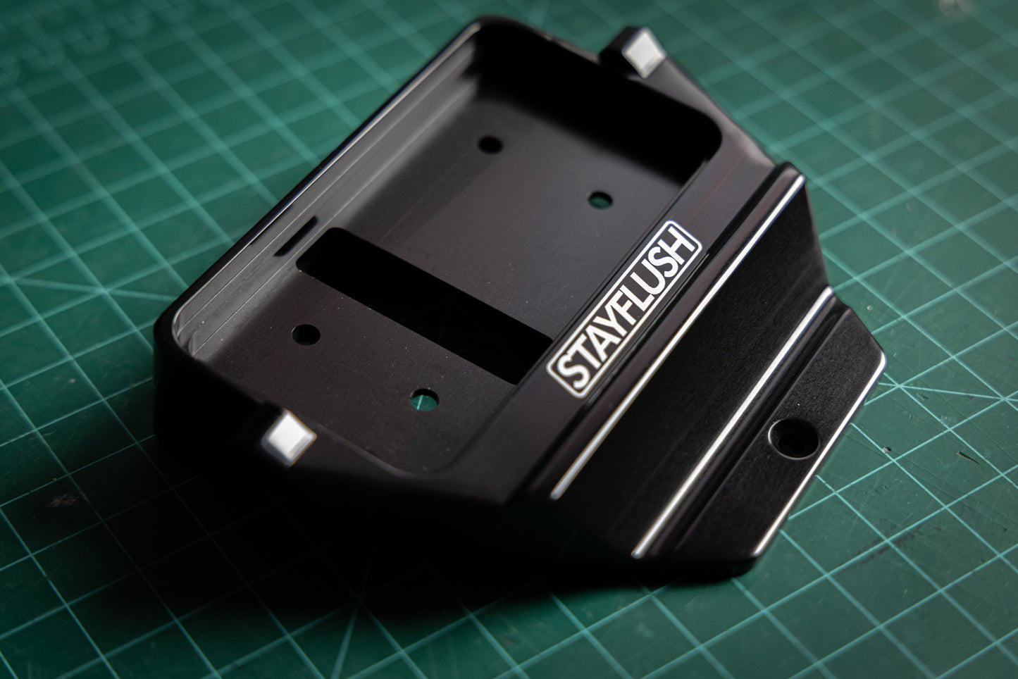 StayFlush Motorsports MaverickR steering wheel switch mount, durable black bracket with ergonomic design for off-road vehicles.