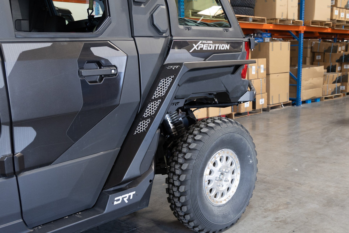 DRT Motorsports Polaris Xpedition Fender Flare Kit front and rear, black plastic fenders for off-road protection.