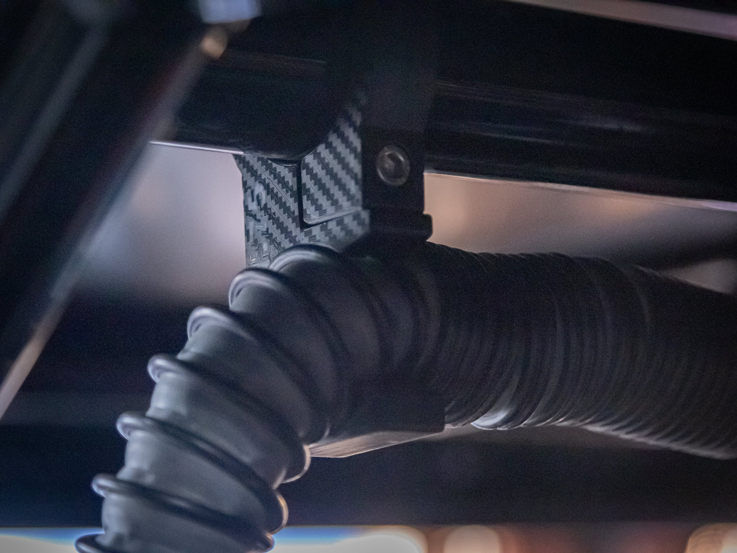 Universal Pumper Hose Cage Mount by StayFlush Motorsports for organized pumper hose storage and secure mounting.