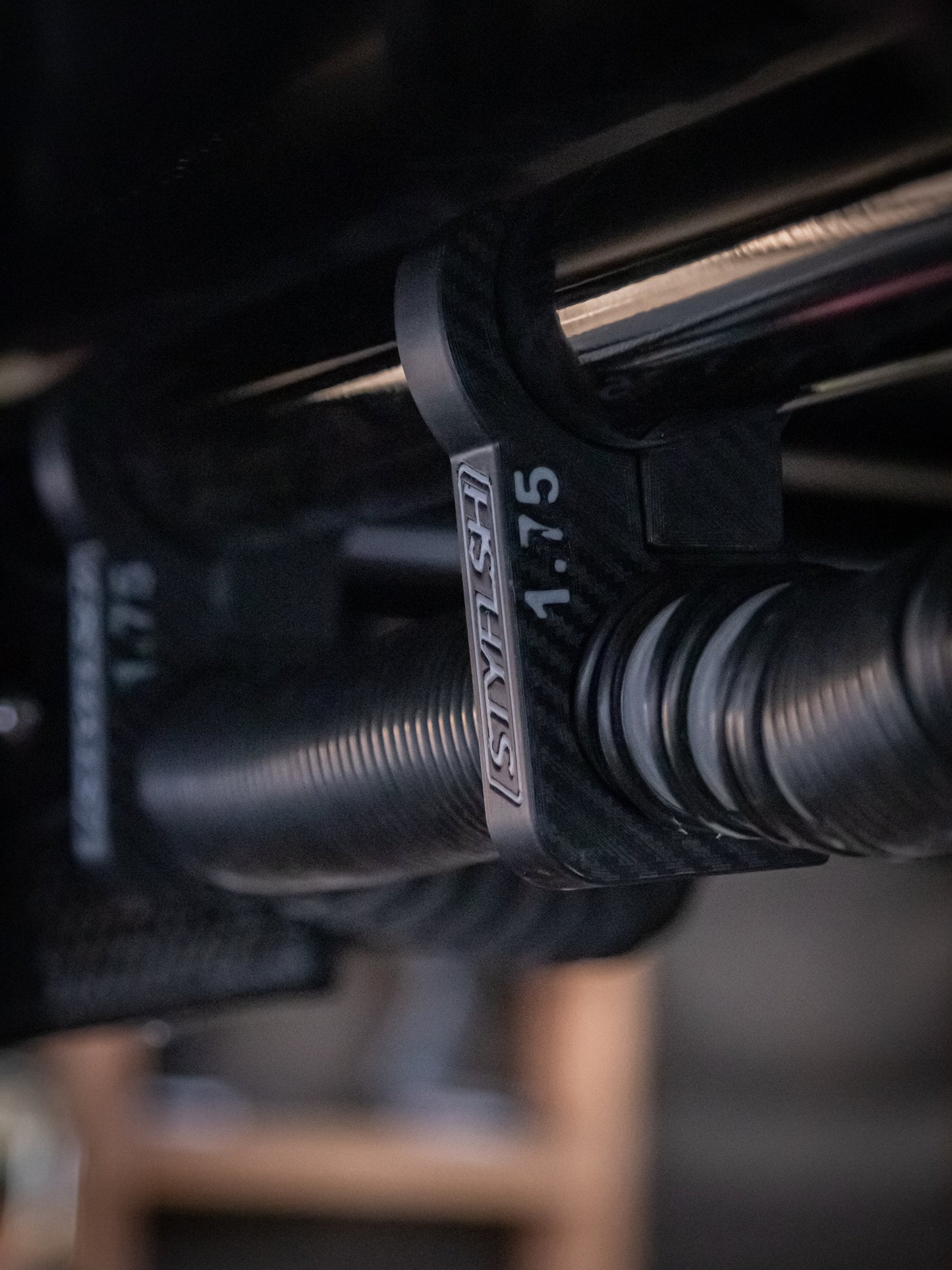 Universal Pumper Hose Cage Mount by StayFlush Motorsports, showing a durable hose holder with mounting brackets for organization.