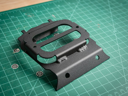 CanamX3 console with StayFlush X3 Lower 6-Gang Auxbeam mount for off-road vehicles, showing durable black mounting hardware.